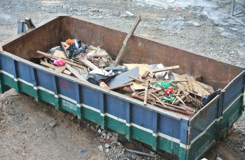 Professional house clearance team working in a South London home