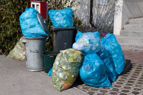 Residential waste collection trucks in South London